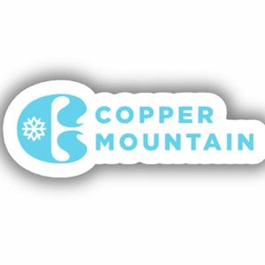May include: A white sticker with the words "COPPER MOUNTAIN" in light blue, with a stylized "C" and snowflake design. The sticker has a drop shadow, creating a 3D effect. The design is clean and modern.