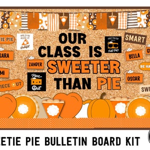 May include: A bulletin board kit with a fall theme. The board is decorated with orange, brown, and white pie-themed cutouts. The text "Our Class Is Sweeter Than Pie" is displayed in black letters on a brown background. The kit includes name tags, a "Piece Out" sign, and other decorative elements.