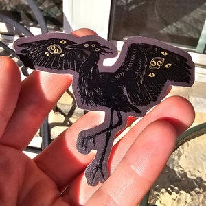 The Cryptid : Heron - Sticker vinyle noir et or réfléchissant
