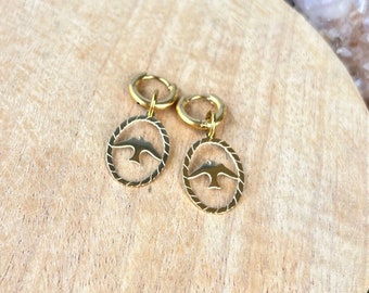 Ring earrings with oval bird pendant in gold stainless steel