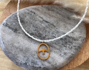 Collier fin de coquillage minimaliste et  pendentif oiseau en acier inoxydable doré