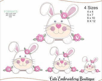May include: Four embroidery designs of a white bunny with pink ears and a pink flower on its head. The bunny is peeking over a branch with pink flowers. The designs are available in four sizes: 4x4, 5x7, 6x10, and 8x12 inches. The text "Cute Embroidery Boutique" is at the bottom of the image.