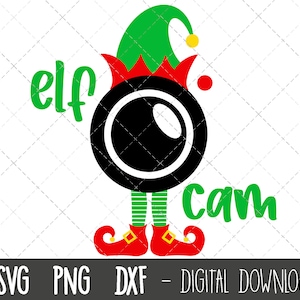 以下が含まれることがあります： 赤い帽子をかぶった緑色のエルフが黒いカメラを持っています。画像の下に「elf cam」というテキストが書かれています。