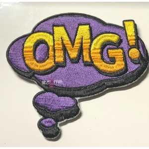 May include: Purple and yellow embroidered iron-on patch with the word "OMG!" in a speech bubble.