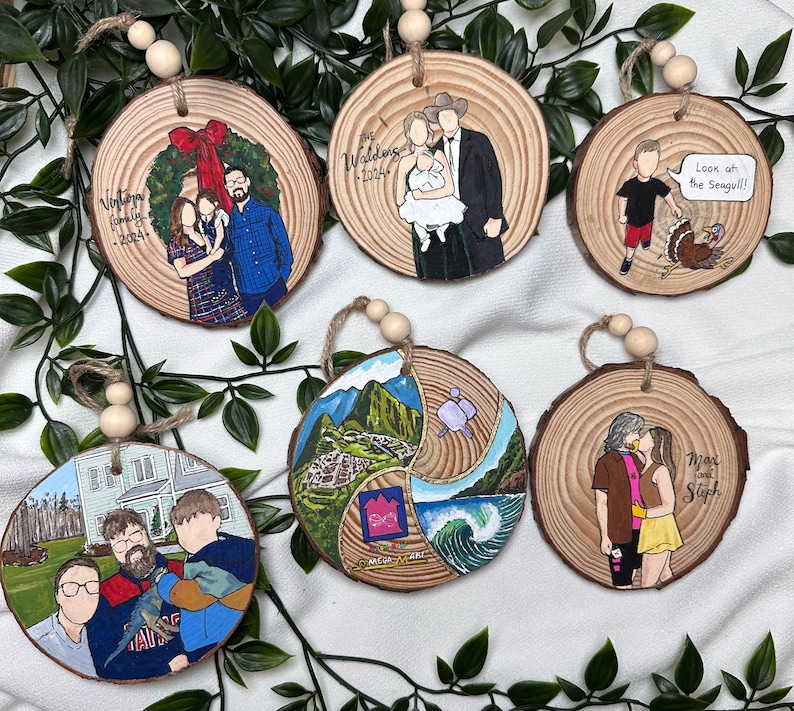 May include: Six round wooden ornaments with painted designs. The ornaments feature a family portrait, a wedding scene, a landscape, a couple, a child with a turkey, and a house with people.