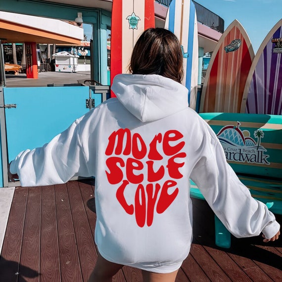 White hoodie with red heart sale
