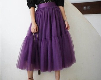 A deep plum layered fine tulle skirt size Medium.