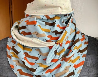 Large reversible scarf with dachshunds that is held together with a button