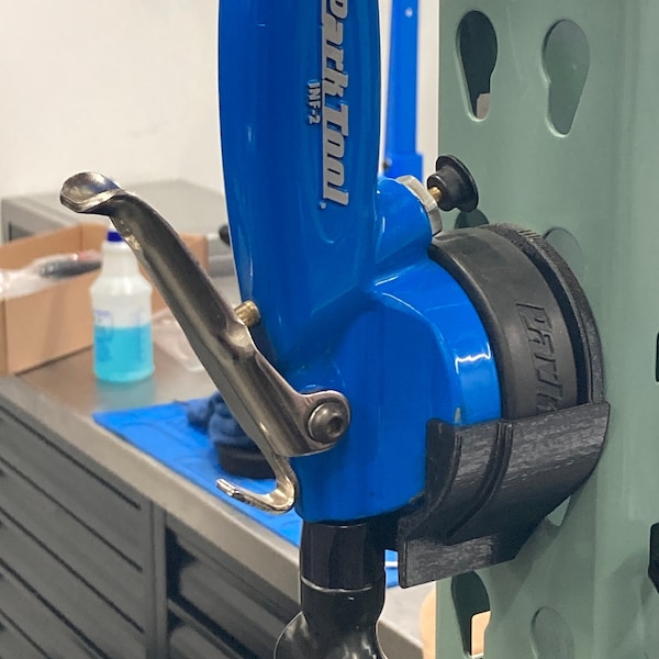 Holder for Park INF-2 inflator (inverted top hose routing)