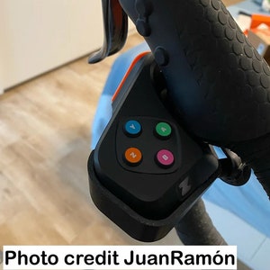 Holders for Zwift Play controller on Stages bikes