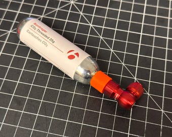 CO2 cartridge storage spacer