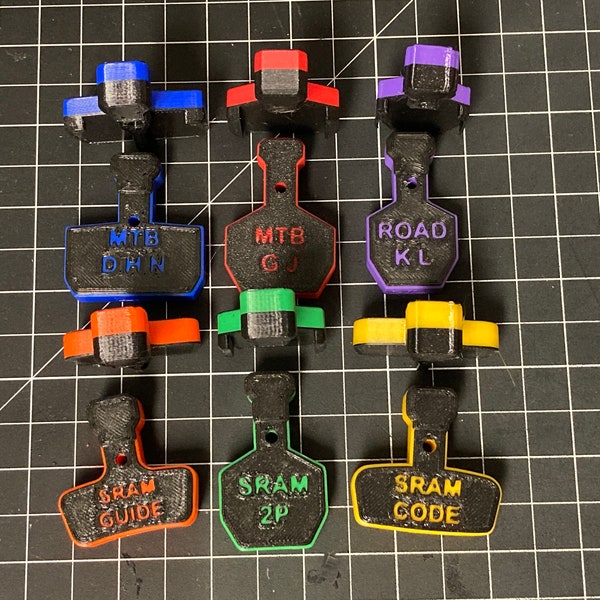 Top loading brake bleed and piston exposure blocks for disc calipers