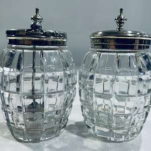 Salt and Pepper set in ‘grenade’ style cut glass with silver plate