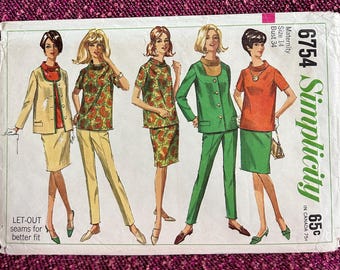May include: A sewing pattern for maternity wear, Simplicity pattern number 6754, size 14, bust 34. The pattern shows four different outfits for pregnant women, including a green pantsuit, a red top with a skirt, a patterned top and skirt, and a jacket with a skirt.