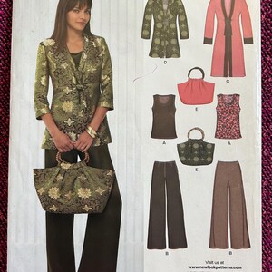 May include: A New Look sewing pattern featuring a woman modeling a green and gold floral patterned jacket, pants, and a matching handbag. The pattern includes various garment designs, including a jacket, dress, and pants.