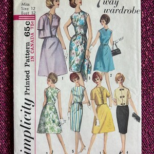 May include: Vintage sewing pattern for a 7-way wardrobe, featuring a sleeveless dress with a variety of styling options. The pattern is for size 12, bust 32, and is printed on a white background with black text. The pattern is labeled "Simplicity Printed Pattern 65c".
