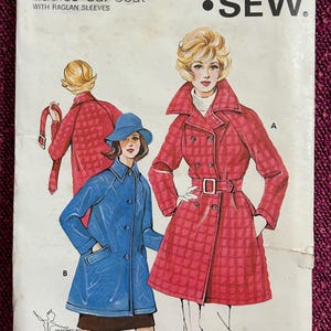 May include: Vintage Kwik Sew pattern 418 for a Ladies' Car Coat with raglan sleeves. The pattern features illustrations of the coat in red and blue. The pattern sizes are 8-10-12. The pattern is from Sew-Knit-N-Stretch, Inc.