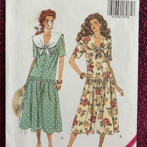 May include: Vintage sewing pattern for a dress and culottes with a sailor collar. The pattern is for sizes 12-14-16 and is from Butterick pattern number 6034.