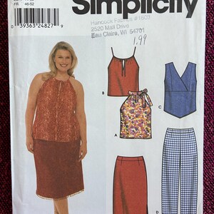 May include: A sewing pattern for a women's top and skirt. The pattern includes a halter top, a sleeveless top, and a skirt with a fringe trim. The pattern is from Simplicity and is size 18W-24W.