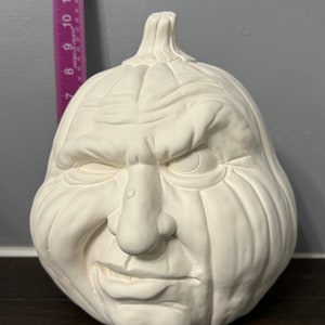 Ready to paint pumpkin with face, ceramic bisque