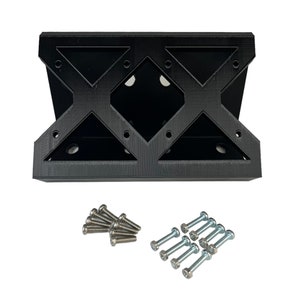 May include: Black, geometric-patterned bracket with an X-shaped design. Includes a set of silver screws and bolts. The bracket has multiple holes for mounting. The product is designed for mounting.