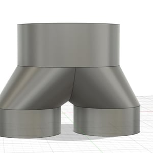 May include: A grey, three-dimensional, Y-shaped pipe fitting with two openings on the bottom and one opening on the top.