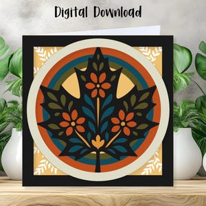Puede incluir: Un archivo digital para descargar que presenta una hoja de arce negra estilizada centrada en un marco circular. La hoja está decorada con patrones florales naranjas y detalles azules, sobre un fondo de círculos concéntricos en naranja, azul y amarillo.