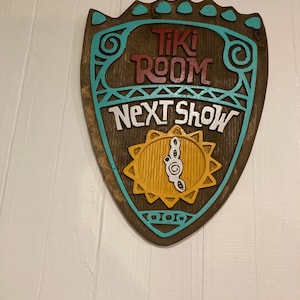 New style disneyland tiki room next show sign