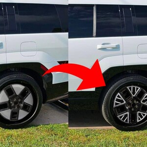 May include: A white SUV with black wheels. The wheels have a black and silver spoke design. The wheels on the left side of the image are plain, while the wheels on the right side of the image have a more intricate design.
