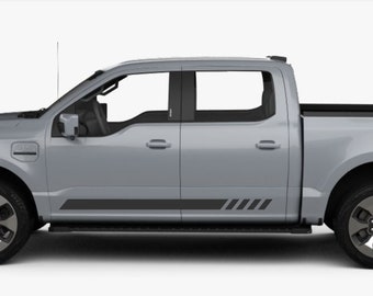 May include: A silver pickup truck with black side steps and black racing stripes on the doors. The truck has a black bed cover and black wheels.