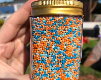 Wackadoo Bluey cartoon kids edible nonpareil sprinkles 100s and 1000s orange blue birthday cake deserts cupcake craft child party jewellery