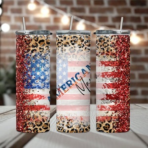 May include: Three stainless steel tumblers with lids and straws. The tumblers feature a patriotic design with the American flag, leopard print, and the text "American Mama". The design incorporates red glitter and blue stars.