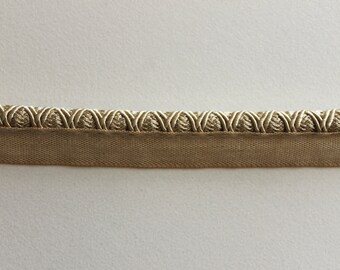 Champagne colored cord trim with lip