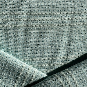Green embroidered dot lined woven textured upholstery fabric remnant 1.5 yards available