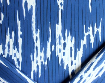 May include: Blue and white fabric with a vertical striped pattern. The fabric has a textured, hand-painted look.