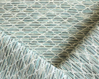 Blue woven diamond patterned geometric upholstery fabric by the yard