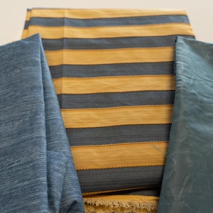Lot of three vintage blue upholstery fabric remnants 9 yards total