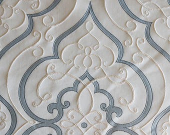 Vintage creme and blue Begonia embroidered reversable fabric by the yard