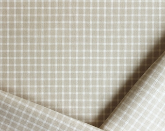 White and cream checkered fabric by the yard