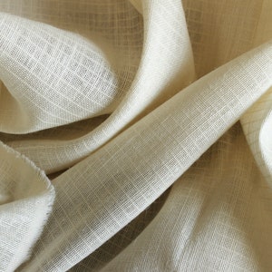 Semi-sheer cream windowpane woven curtain fabric by the yard
