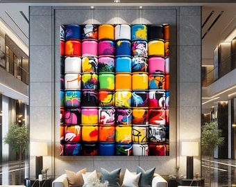 May include: A large rectangular wall art piece featuring a grid of colorful spray paint cans. Each individual can is decorated with vibrant graffiti-style markings in shades of red, yellow, blue, pink, orange, and black, creating a bold mosaic.