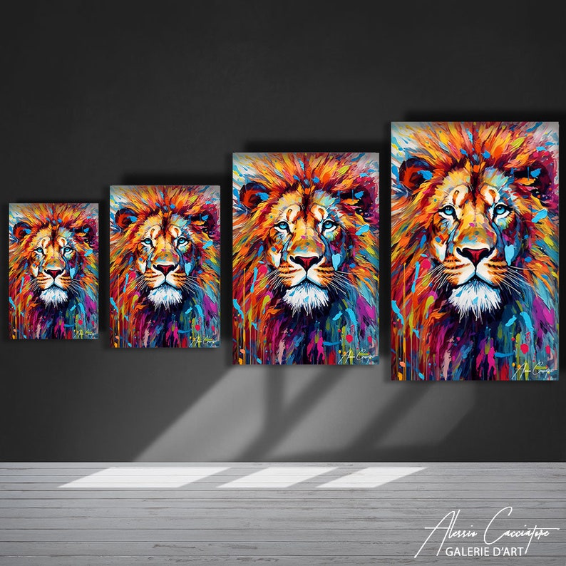 May include: A colourful abstract painting of a lion's face with splashes of paint in shades of red, orange, yellow, blue, green, and purple. The lion's eyes are a bright blue. The painting is available in four different sizes.