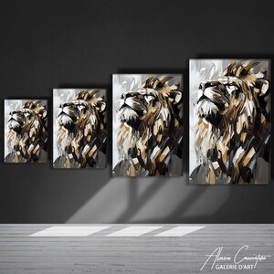 May include: Four canvas prints of a lion's head, rendered in a modern, abstract style. The artwork features a palette of brown, black, and white, with the lion gazing upwards. The prints vary in size, displayed against a dark gray wall.