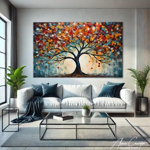 May include: A large, colorful abstract painting of a tree with a black trunk and branches, and a canopy of orange, red, yellow, and blue leaves. The painting hangs above a white sofa with blue pillows in a modern living room setting.