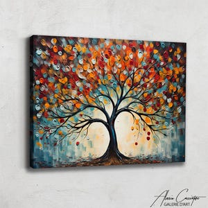 May include: An abstract tree painting with a black trunk and branches, and a vibrant canopy of orange, red, and yellow leaves. The background features blue and cream brushstrokes, creating a textured effect. The artwork is signed in the bottom right corner.
