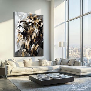 May include: Large abstract painting of a lion's head in shades of brown, black, and white. The artwork is displayed on a white wall above a white sectional sofa in a modern living room setting. The lion is looking upwards.