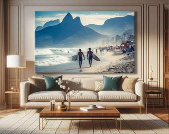 May include: A large canvas print depicts a beach scene with two people carrying surfboards, walking towards the viewer. Mountains are in the background. The artwork is displayed above a beige sofa with teal and beige pillows, and a wooden coffee table.