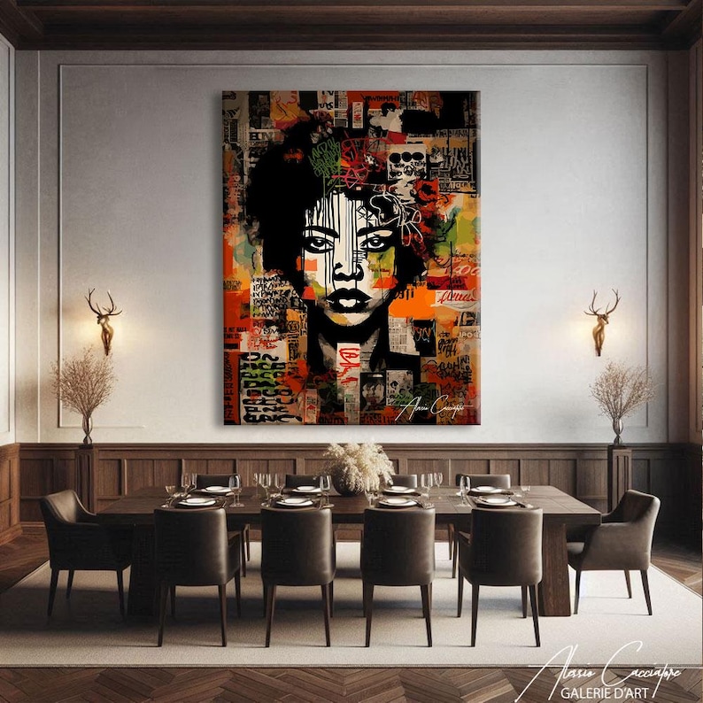 May include: Large abstract artwork depicting a woman's face against a collage of text and colours. The art piece features a black and white face with orange, green, and red accents. The artist's signature is visible in the bottom right corner.