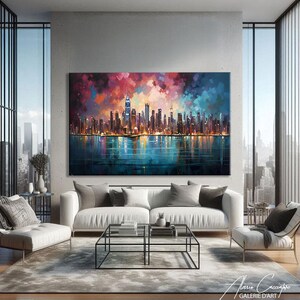 NYC skyline canvas print featuring a stunning panoramic view of Manhattan's illuminated skyscrapers at night reflected on a calm teal water surface, set beneath a dramatic mosaic-style expressionist sky of deep red, purple, rose and electric blue palette knife brushstrokes creating a vibrant jewel-toned canopy above the glittering city lights. Bold cubist-inspired painting style with rich multicolored tones on a dark background. Premium fine art canvas handcrafted in Germany.