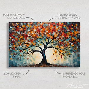 May include: An abstract painting of a tree with a black trunk and branches, and colorful leaves in shades of orange, red, and yellow. The background has blue and beige brushstrokes. The artwork is framed with a 2cm wooden frame.